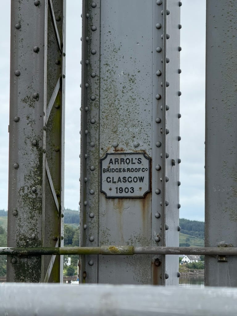 Plaque on Connel Bridge showing builder's name and date.