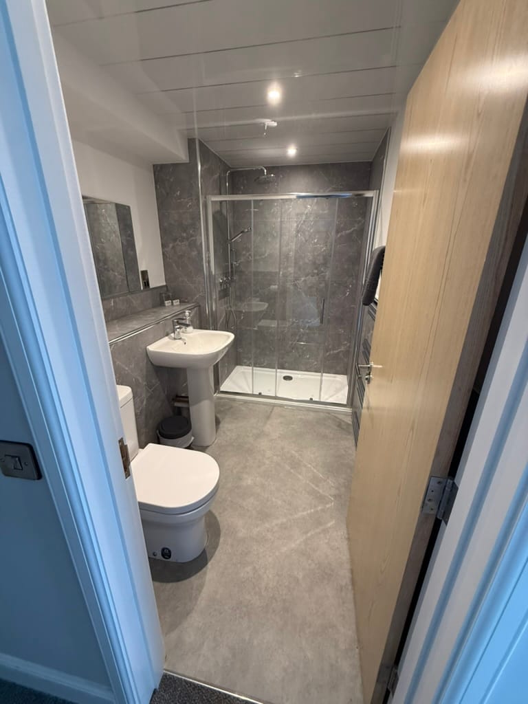 Modern hotel bathroom with walk-in showe