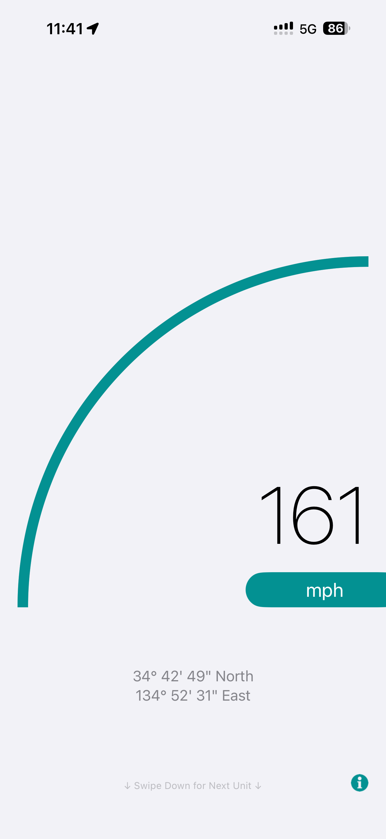Smartphone speedometer app showing a speed of 161 mph and GPS coordinates while travelling on a Shinkansen, with a 5G signal and battery level visible.