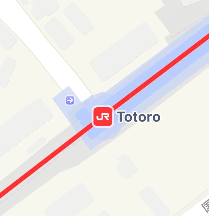 Smartphone map showing a train passing through Totoro Station on the JR Nippo Main Line in Miyazaki Prefecture, during a journey north through Kyushu.