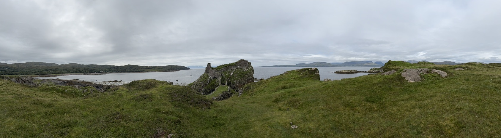 Panoramic view of Dunscaith Castle ruins overlooking the Sound of Sleat on the Isle of Skye.
