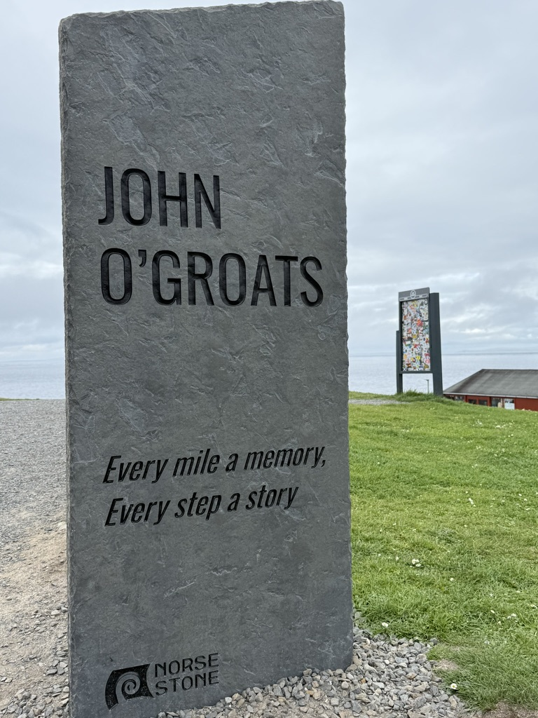 John O' Groats stone marker with engraved lettering.