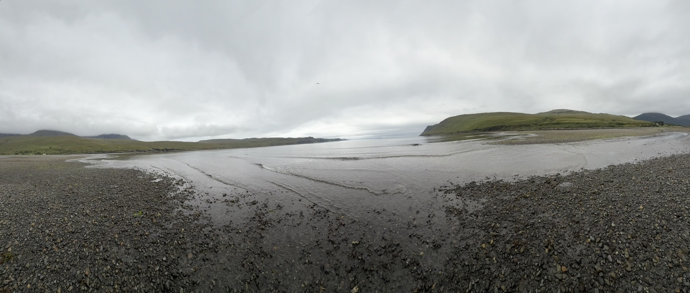 Panoramic view across the tidal flats and shoreline at Glen Brittle on the Isle of Skye.