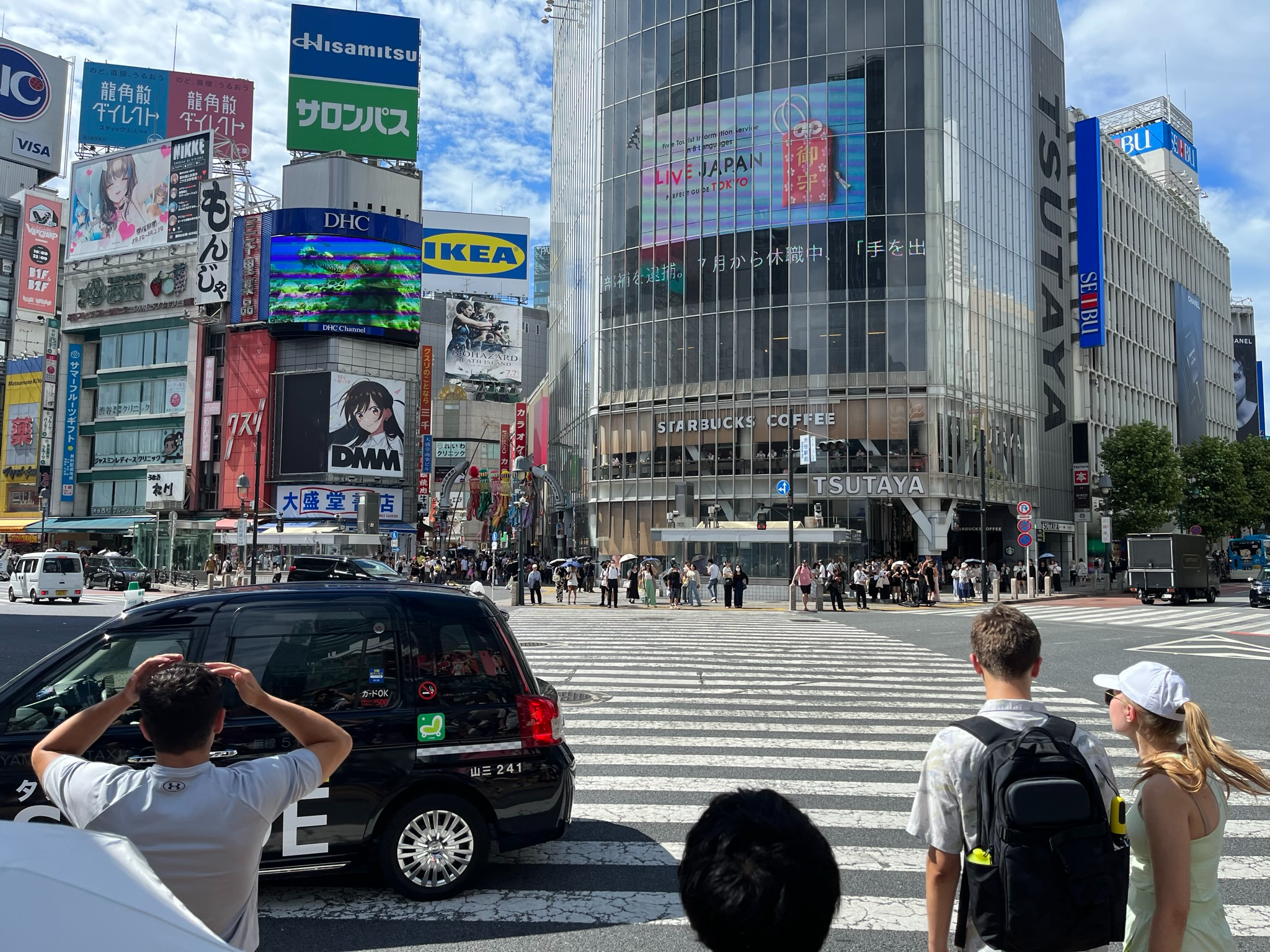Shibuya Scramble Crossing pulses with the energy of modern Tokyo, where towering digital billboards, famous landmarks and waves of pedestrians converge at one of the world's busiest and most recognisable urban intersections.