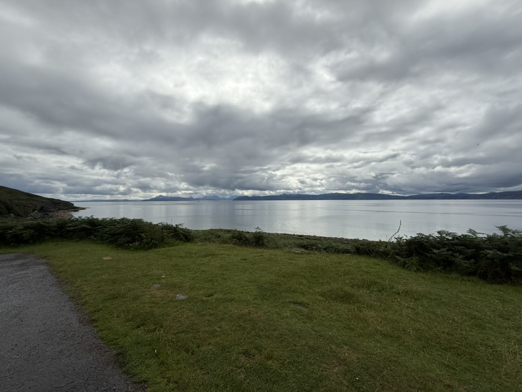 View across the Inner Sound towards the Isle of Skye under dramatic clouds.