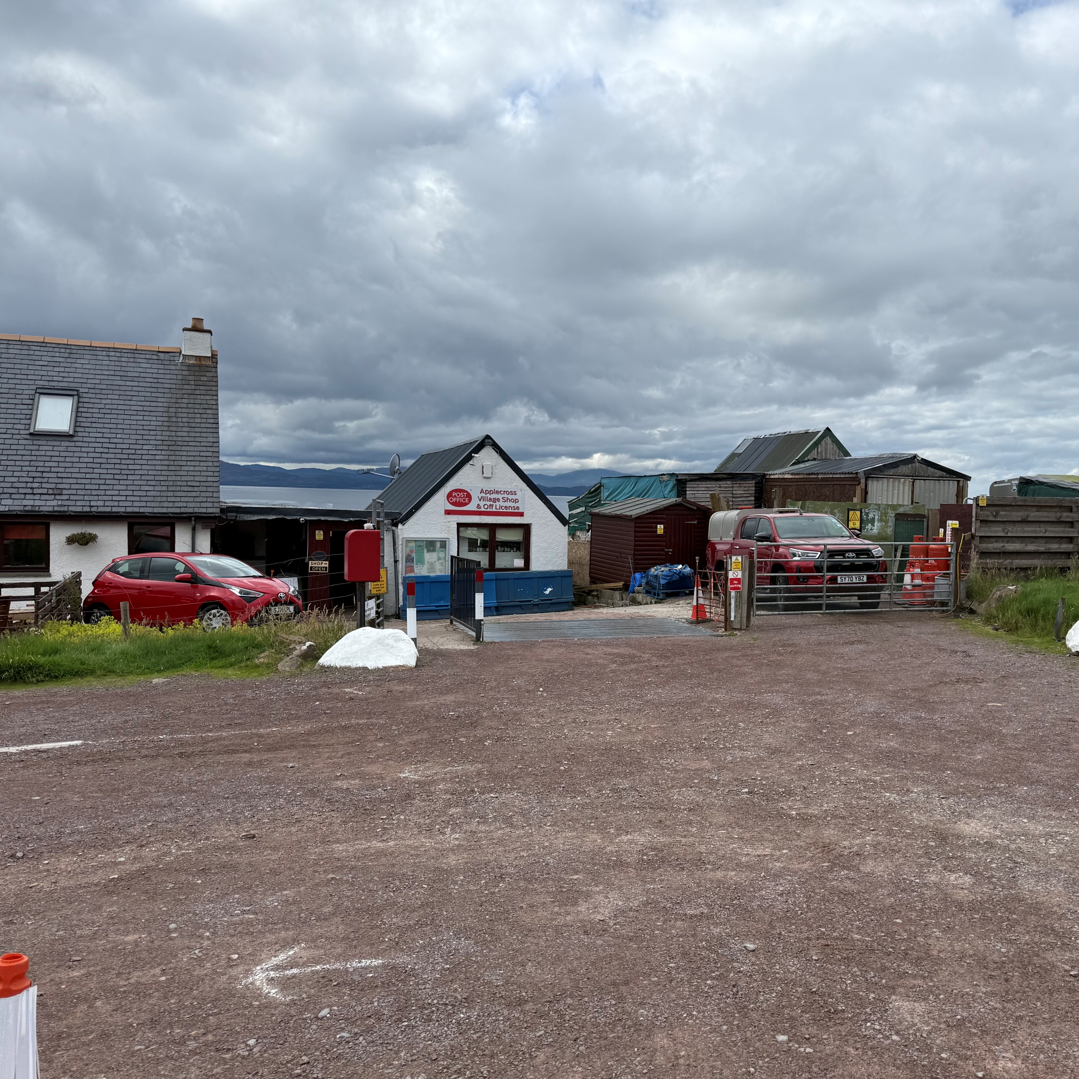 Applecross Village Shop and Post Office under stormy skies.