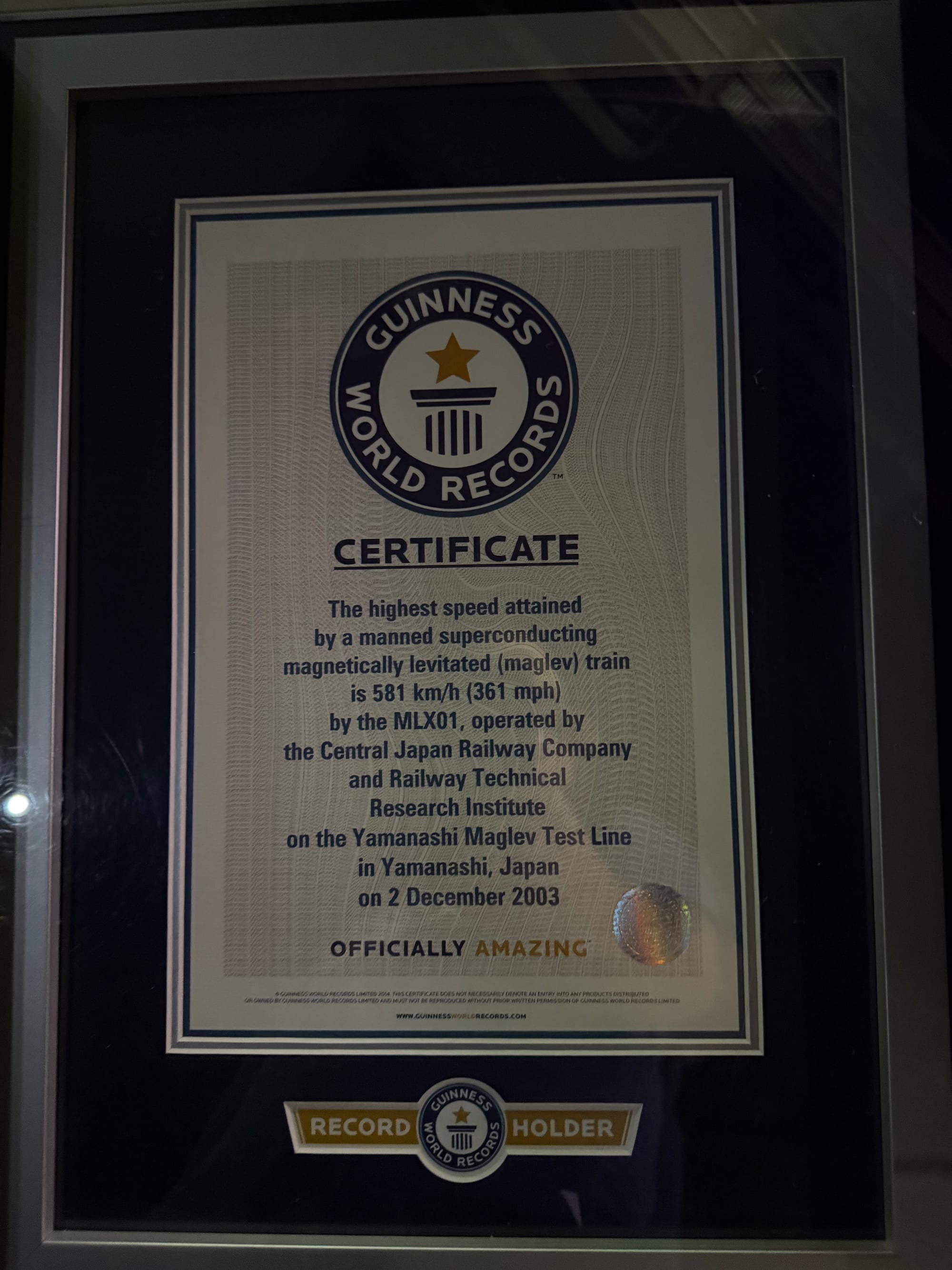 Guinness World Records certificate at the SCMAGLEV and Railway Park recognising the MLX01 maglev train's speed record of 581 km/h, achieved in Japan in 2003.