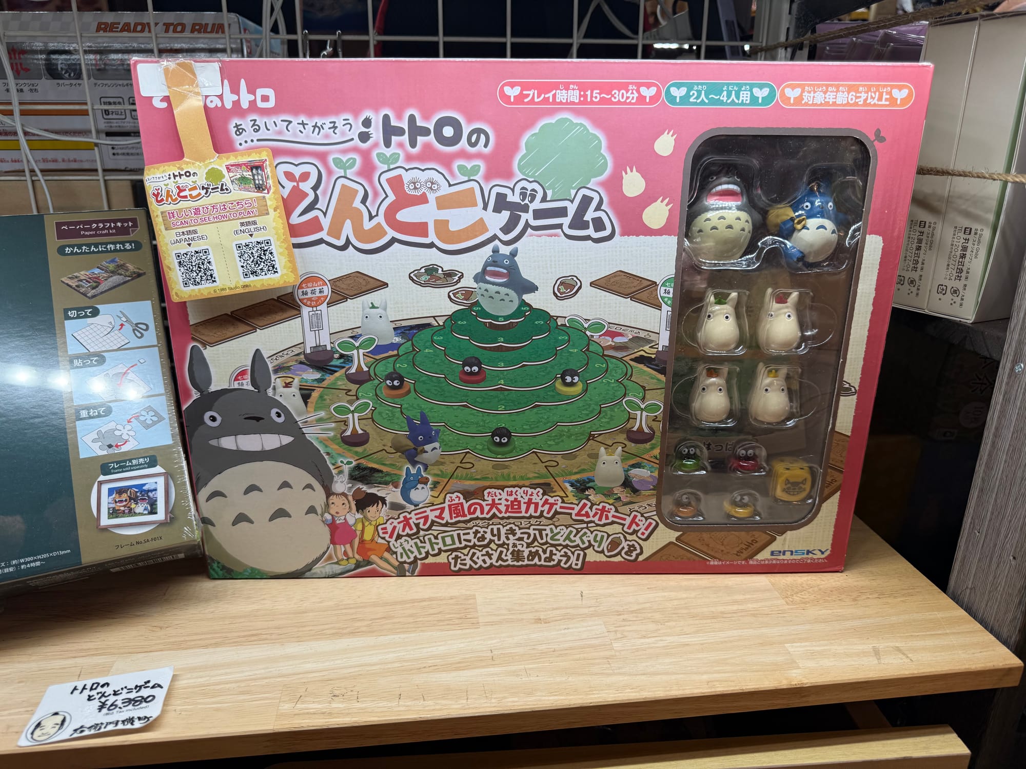 Boxed My Neighbour Totoro board game displayed in a game shop in Takayama, featuring Totoro figurines, character tokens and Japanese packaging artwork.