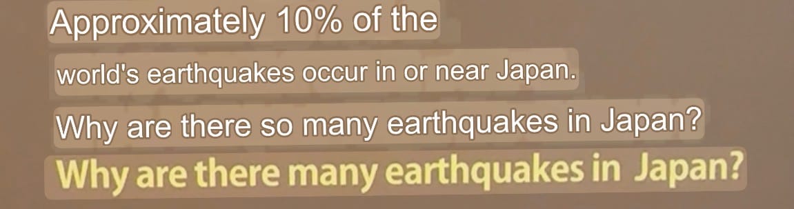 çExhibit panel explaining why Japan experiences frequent earthquakes, noting that about 10% of the world's earthquakes occur in or near Japan because of its tectonic setting.